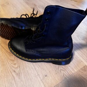 Doc Martens black leather mid calf boots.